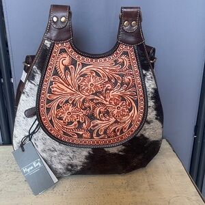 Myra-Daisy Hill Trail Hand-Tooled
Backpack Bag